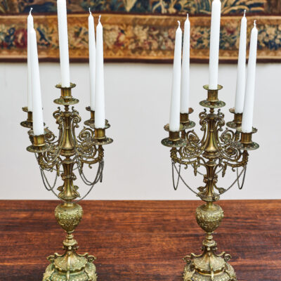 Paired brass candlesticks in Renaissance style, height 53 cm