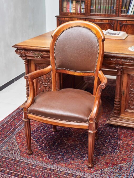 Antique massive chair to the desk