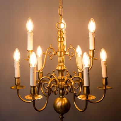 A nine -frame brass chandelier of a Dutch type